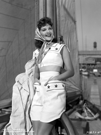 Mary Martin wearing a White Dress and a Scarf on Her Head Photo by  Movie Star News