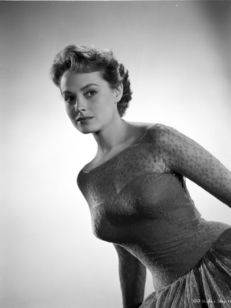 Victoria Shaw photographed wearing a sweetheart neck line, ballgown, with a long-sleeve lace over-l Photo by  Movie Star News