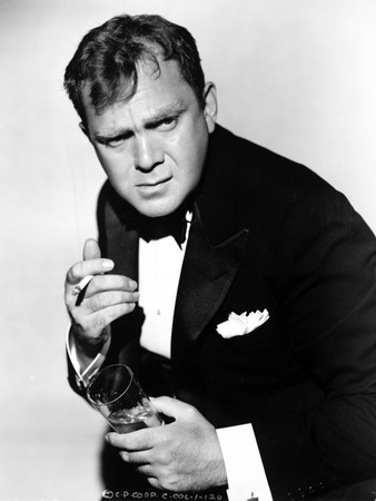 Thomas Mitchell Posed in Black Suit Photo by  Movie Star News