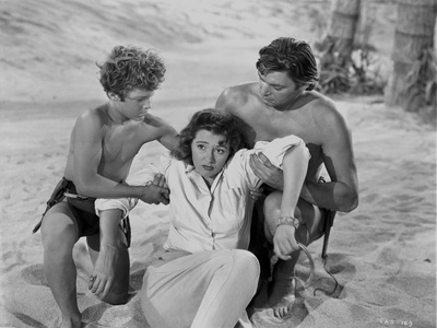 Johnny Weissmuller Helping a Woman with the Help of a Young Man in a Classic Movie Scene Photo by  Movie Star News