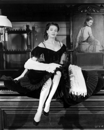 Yvonne Decarlo posed in Sexy Black Outfit With White Scarf in Black and White Photo by  Movie Star News