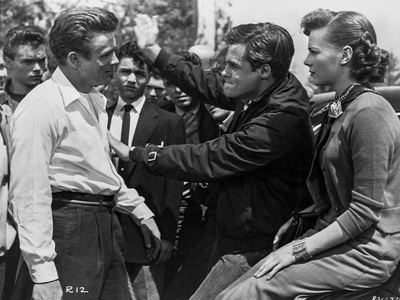 James Dean Scene from a Film standing in White Tucked-On Long Sleeve Collar Shirt and Linen Pants Photo by Floyd Mccarty