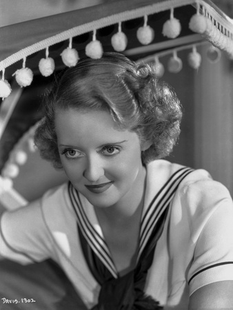 Bette Davis Portrait Seated in White Short Sleeve Sailor Uniform with Black Scarf Tied Loose Photo by John Ellis