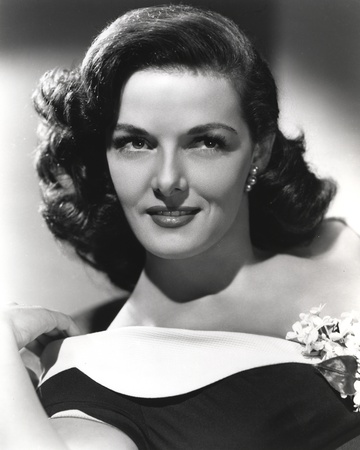 Jane Russell Portrait in Black Velvet Dress with White Collar and Flower Corsage on the Middle Photo by  Movie Star News