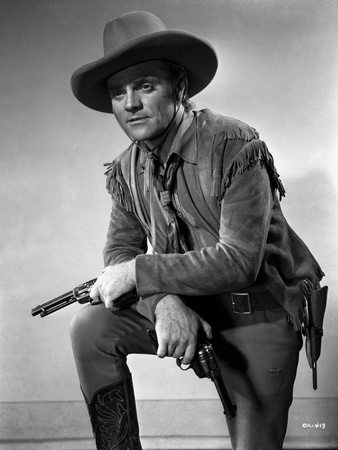 James Cagney Posed in Velvet Long Sleeve and Cowboy Brimmed Hat with Pistol on the Left Hand Photo by  Hurrell