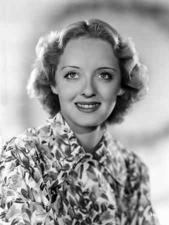 Bette Davis Portrait smiling in Floral White Dress and Neckerchief Photo by Elmer Fryer