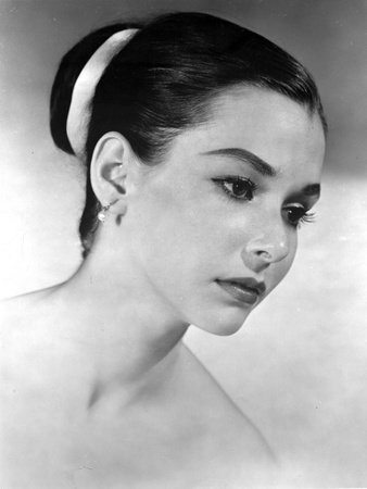 Susan Strasberg wearing an earrings and Harin in Bun Hairdo Photo by  Movie Star News