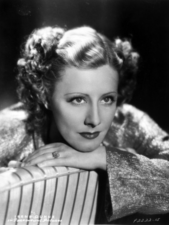 Irene Dunne on Dress sitting and Leaning Portrait Photo by  Movie Star News