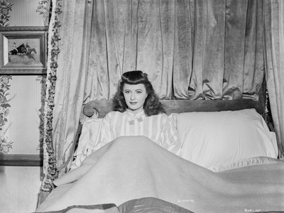 Barbara Stanwyck sitting in Bed Classic Portrait Photo by  Movie Star News