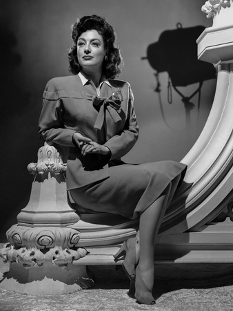 Joan Crawford sitting on a Wall Pillar in Classic Photo by A.L. Schafer