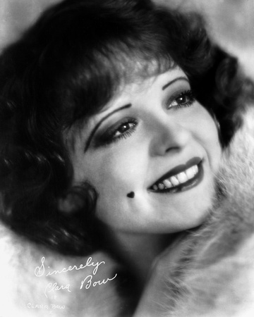 Clara Bow smiling in Fur Dress with Mole on Right Cheeks Photo by ER Richee