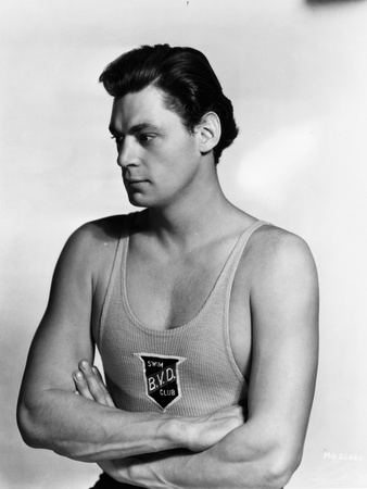 Johnny Weissmuller wearing a Tank top in a Portrait Photo by  Movie Star News