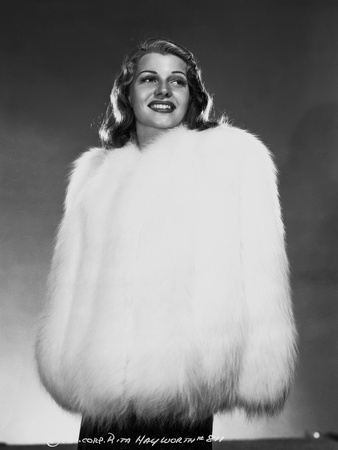 Rita Hayworth Posed in White Furry Garment Photo by Robert Coburn