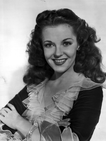 Vivian Blaine on a Ruffled Top and smiling Photo by  Movie Star News