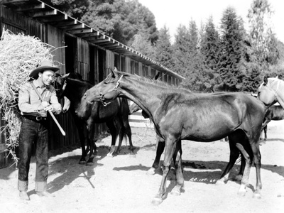 Roy Rogers Carrying Hay Photo by  Movie Star News