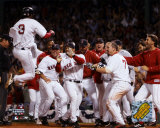 Pokey Reese jumping on plate scoring Game 3 - 2004 ALDS winning run against Angels ©Photofile Photo