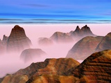 Brume sur des formations rocheuses Photographie par Cindy Kassab