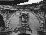 A Boy Framed in the Window of a Cathedral Ruined in an Earthquake Photographic Print by Luis Marden