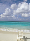 Lone Lounge Chair on Sandy Beach Photographic Print by Jack Hollingsworth