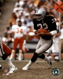 Marcus Allen - Black Uniform With Ball Photo