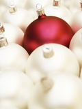 White Christmas tree decorations and a red one Photographic Print