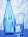 Bottle and glass of water Photographic Print