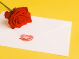 Envelope with lipstick kiss, red rose Photographic Print