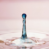 Droplet of Blue Water Photographic Print