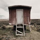 A dilapidated mobile home with crumbling staircase Photographic Print