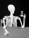 Skeleton Holding Hourglass Photographic Print by Bettmann 