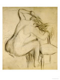A Seated Woman Styling Her Hair Giclee Print by Edgar Degas