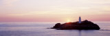 Sunset, Godrevy Lighthouse, Cornwall, England, United Kingdom Stampa fotografica di Panoramic Images Sunset, Godrevy Lighthouse, Cornwall, England, United Kingdom Stampa fotografica di Panoramic Images