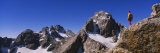 Low Angle View of a Person Standing on a Rock, Grand Teton National Park, Wyoming, USA Photographic Print by Panoramic Images 