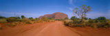 Desert Road and Ayers Rock, Australia Fotografie-Druck von Panoramic Images 