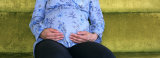 Mid Section View of a Pregnant Woman Touching Her Abdomen, USA Photographic Print by Panoramic Images 