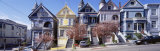 Cars Parked in Front of Victorian Houses, San Francisco, California, USA Lámina fotográfica por Panoramic Images Cars Parked in Front of Victorian Houses, San Francisco, California, USA Lámina fotográfica por Panoramic Images