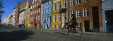 Woman Riding a Bicycle, Copenhagen, Denmark Photographic Print by Panoramic Images 