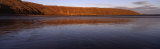 Reflection of a Hill in Water, Filey Brigg, Scarborough, England, United Kingdom Photographic Print by Panoramic Images