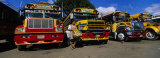 Buses Parked in a Row at a Bus Station, Antigua, Guatemala Photographic Print by Panoramic Images 