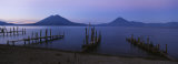 Piers Over a Lake, Guatemala Photographic Print by Panoramic Images 