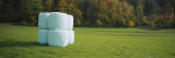 Stack of Hay Bales Wrapped in Plastic, Germany Photographic Print by Panoramic Images Stack of Hay Bales Wrapped in Plastic, Germany Photographic Print by Panoramic Images