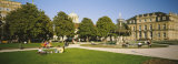 Group of People Sitting Around a Fountain in a Park, Stuttgart, Baden-Wurttemberg, Germany Photographic Print by Panoramic Images 