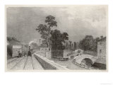 Train Pulls into the Station with Passengers Waiting on the Tracks Giclee Print by E. Radclyffe