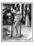 Young Woman in an Abstract Print Bikini with Broderie Anglaise Trim Towel Dries Her Hair Giclee Print