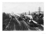 Goods Train Waits on One Track to Let the Passenger Train Go Through Lámina giclée Goods Train Waits on One Track to Let the Passenger Train Go Through Lámina giclée