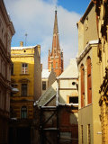 Spire of St. Saviour's Church Seen from Small Back Lane, Riga, Latvia Photographic Print by Jonathan Smith