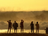 People Checking Out Waves, Banzai Pipeline, North Shore, at Sunset, U.S.A. Photographic Print by Ann Cecil
