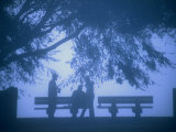 People Meet along the Fog Shrouded Mississippi River Walk, New Orleans, Louisiana, USA Photographic Print by Ray Laskowitz