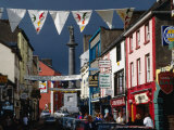 Street Decorated with Buntings and Signs, Ennis, Ireland Photographic Print by Wayne Walton