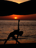 Woman Doing Yoga at Sunset, Phuket, Thailand, United States of America Photographic Print by Jerry Alexander